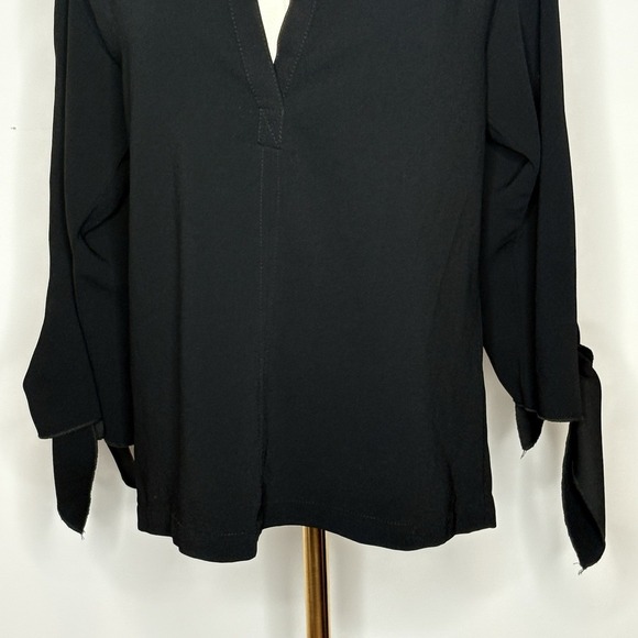 Trina Turk Black Split Neck Blouse XS Long Sleeve Tie Cuff Minimalist Style - Picture 3 of 10